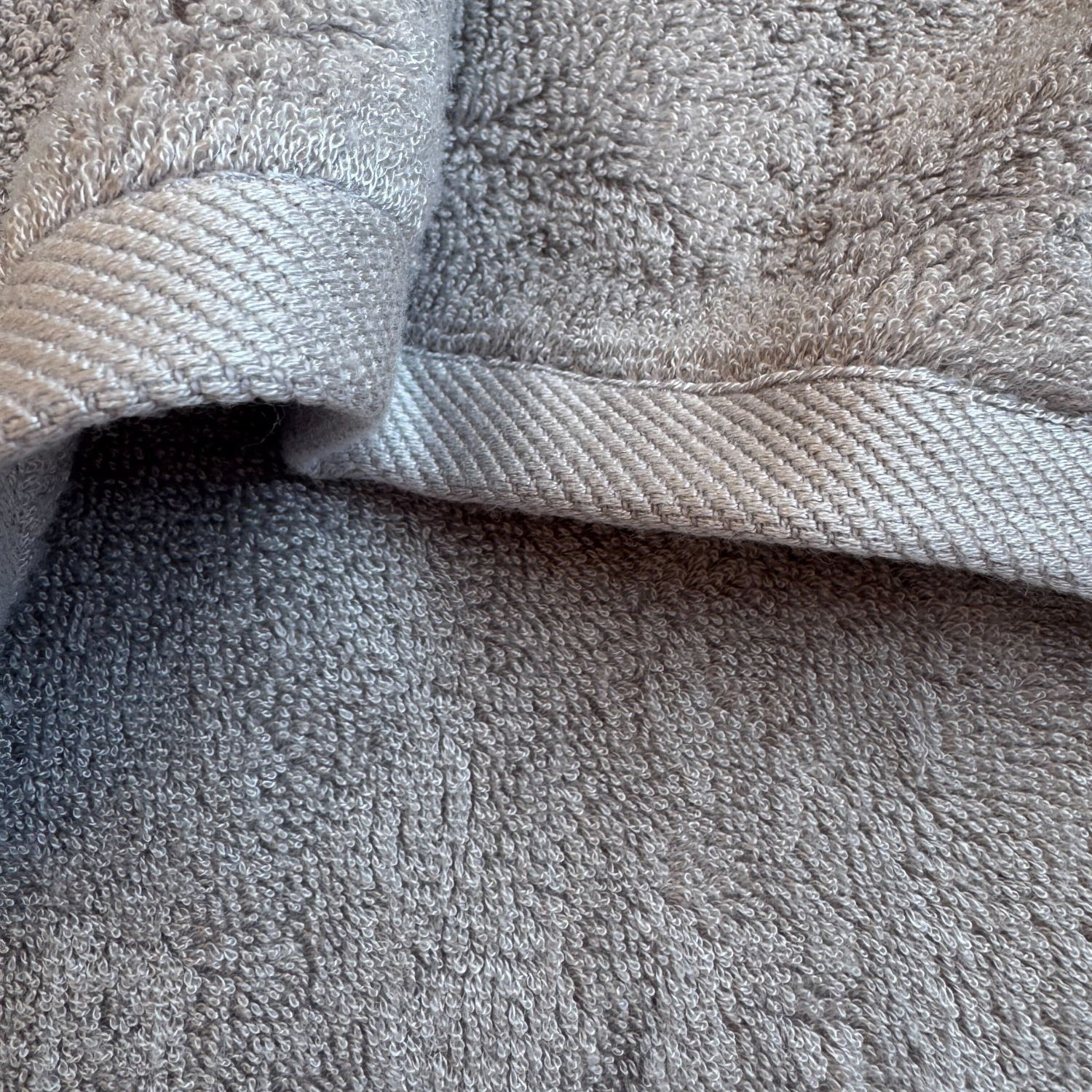 Close-up of grey bamboo towel texture – soft, absorbent and sustainable