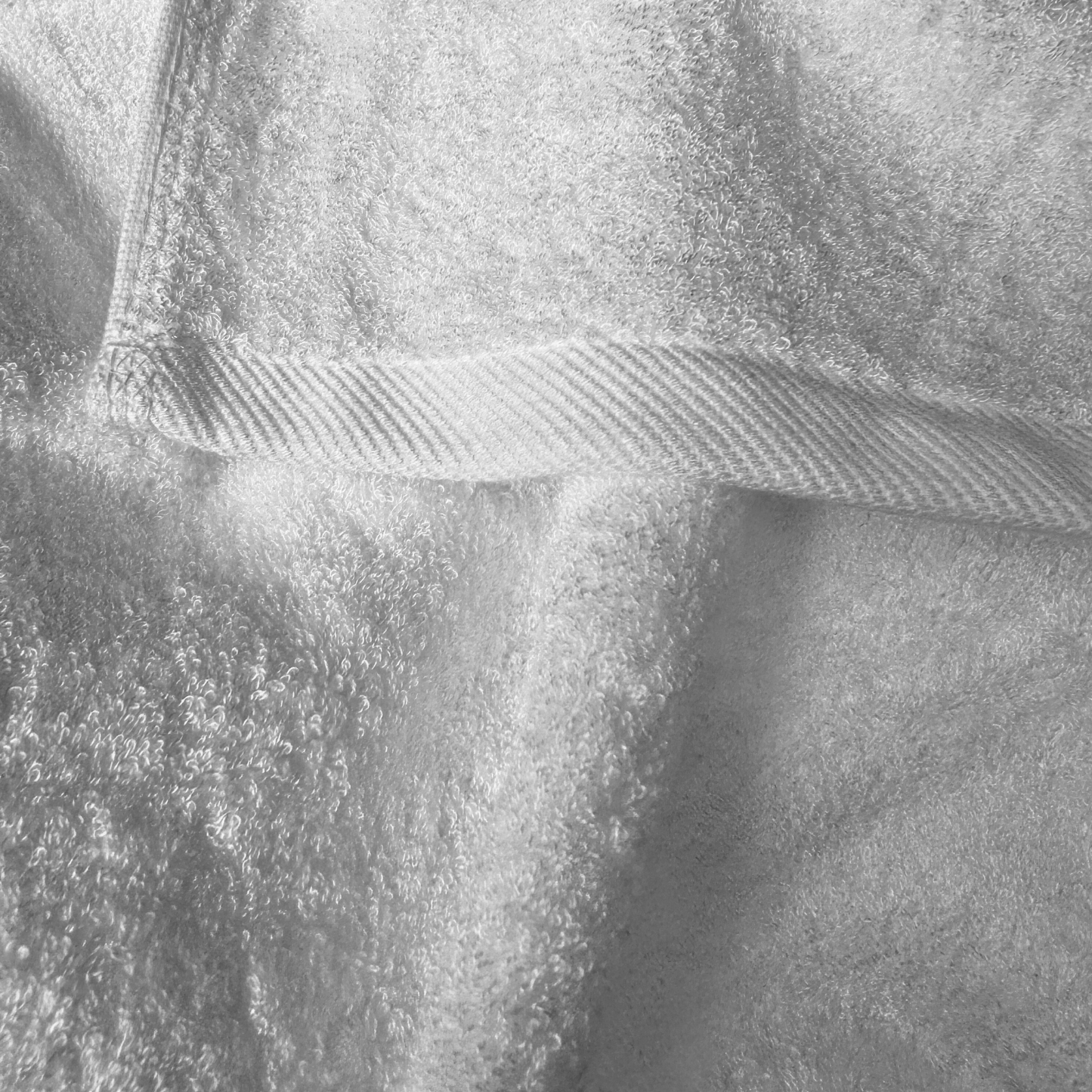 Close-up of white bamboo towel texture – soft, absorbent and sustainable
