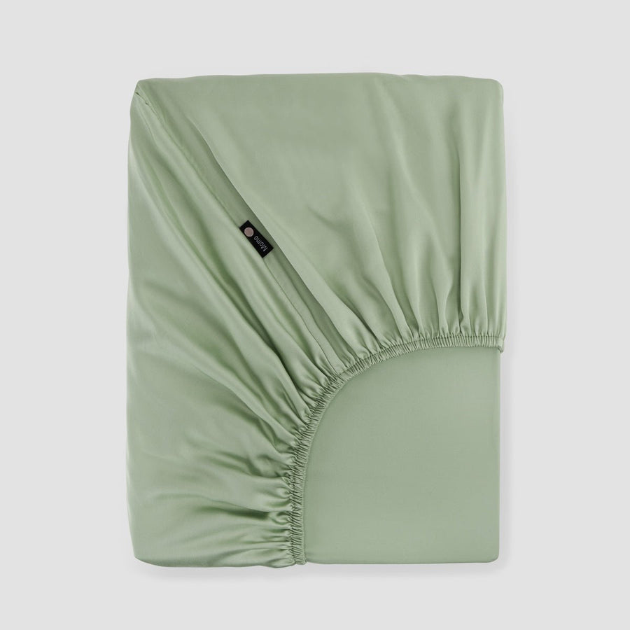 Lençol de baixo ajustável verde bambu by Momo Cotton – tecido de cetim 300 fios, suave, respirável e sustentável.