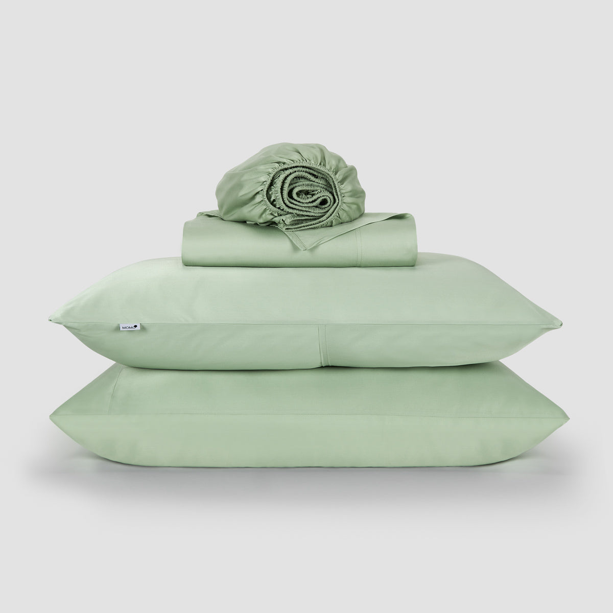 Jogo Lençol de Cima verde bambu by Momo Cotton – tecido de cetim 300 fios, suave, respirável e sustentável.