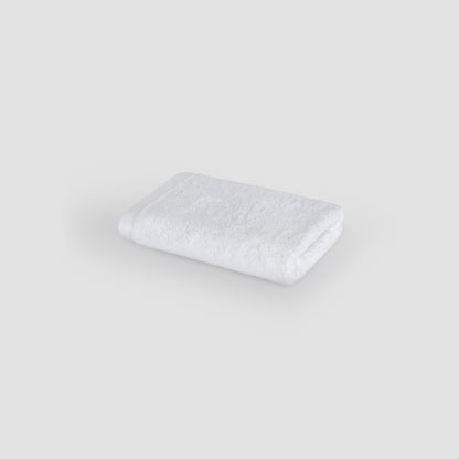 Toalha de rosto branco em bambu da Momo Cotton – macia, absorvente, seca rápido e sustentável